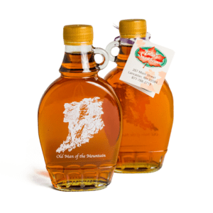 Fuller's Sugarhouse Pure NH Maple Syrup in a Glass Bottle featuring the Old Man in the Mountain